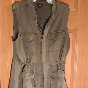 Olive green vest.  Trendy.