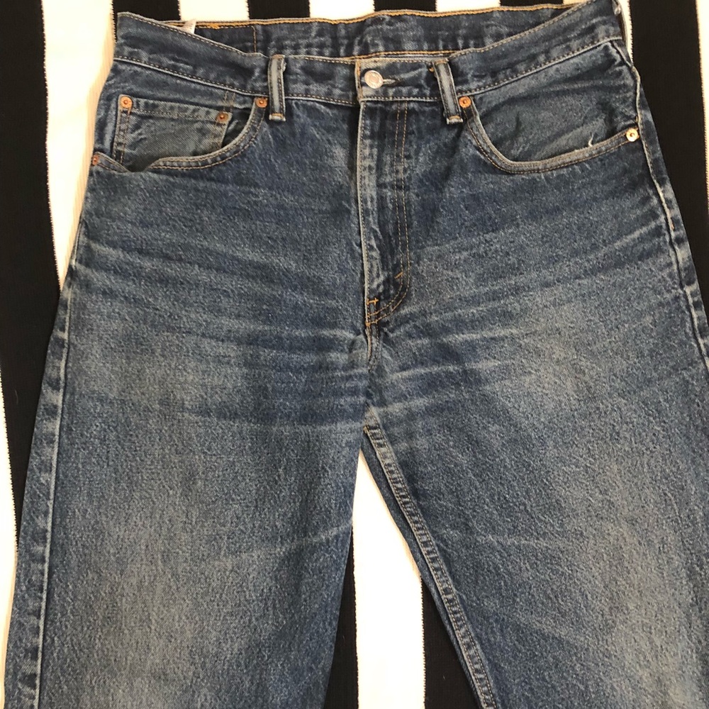 Vintage Levi’s 550 distressed denim jeans