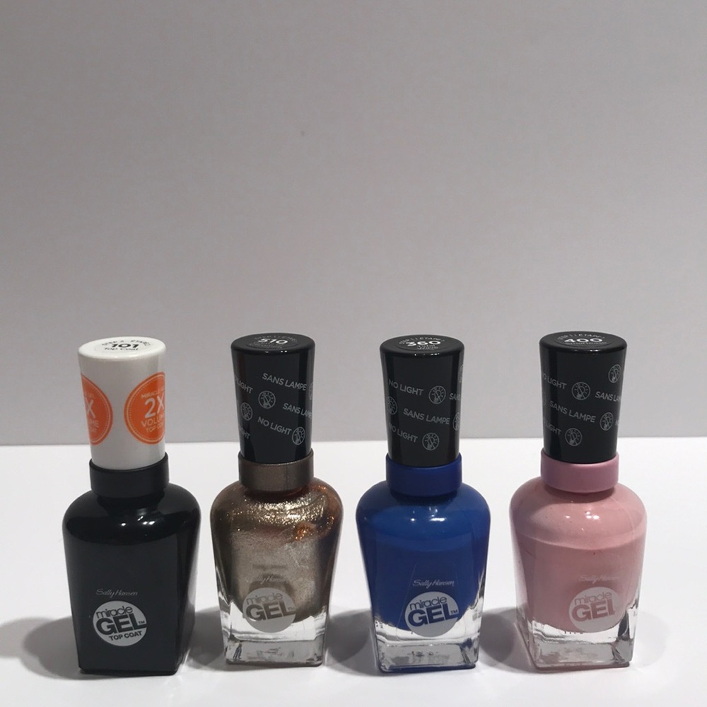 Gel nail polish: gold, blue, pale pink, top coat