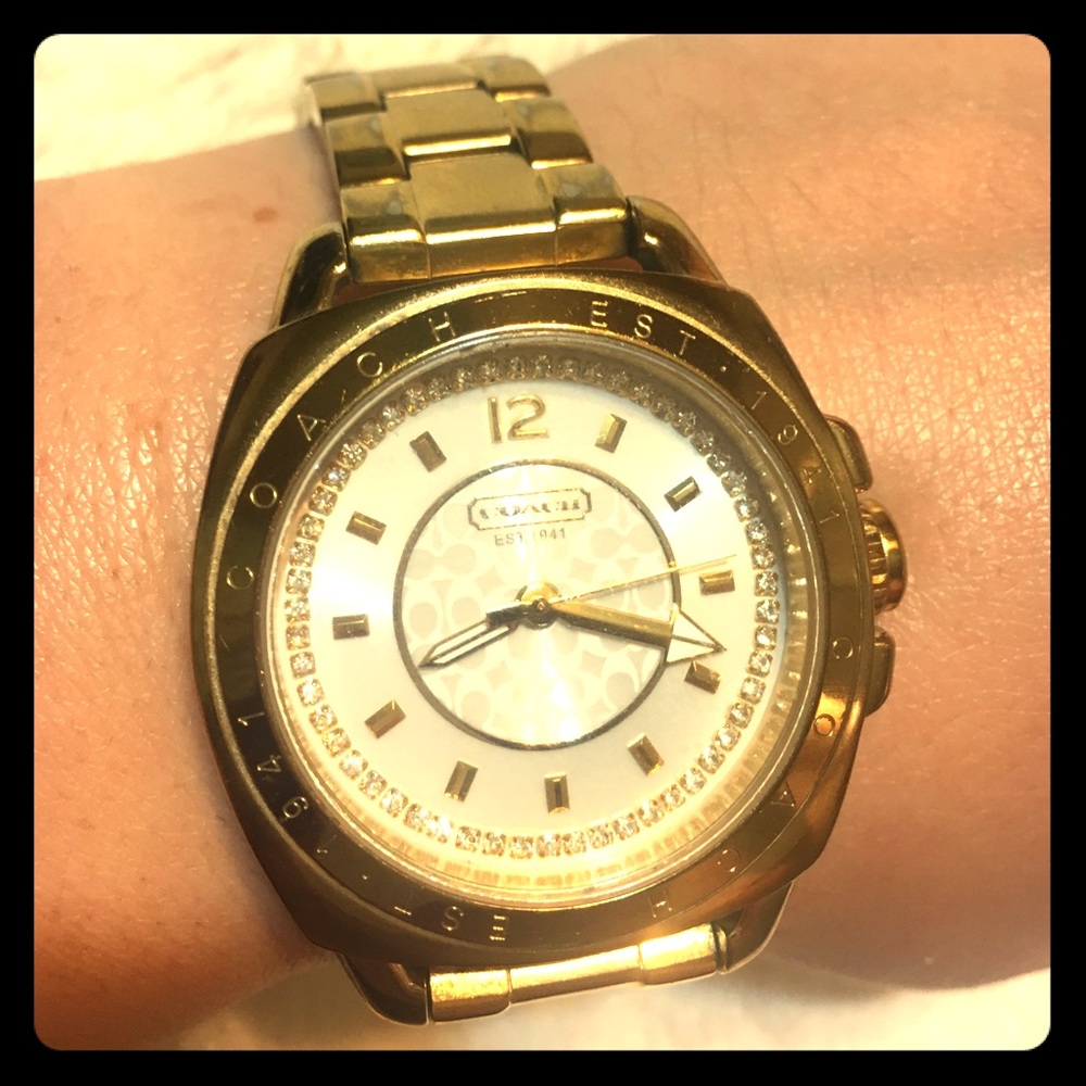 Gold coach watch