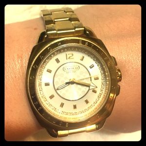 Gold coach watch