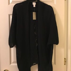 Chico’s black 3/4 sleeve sweater with lace back.