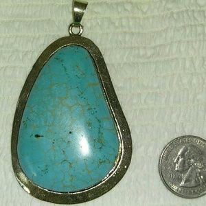 Stunning accent piece, large turquoise pendant..