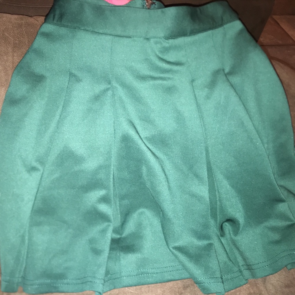 Green pleated skirt