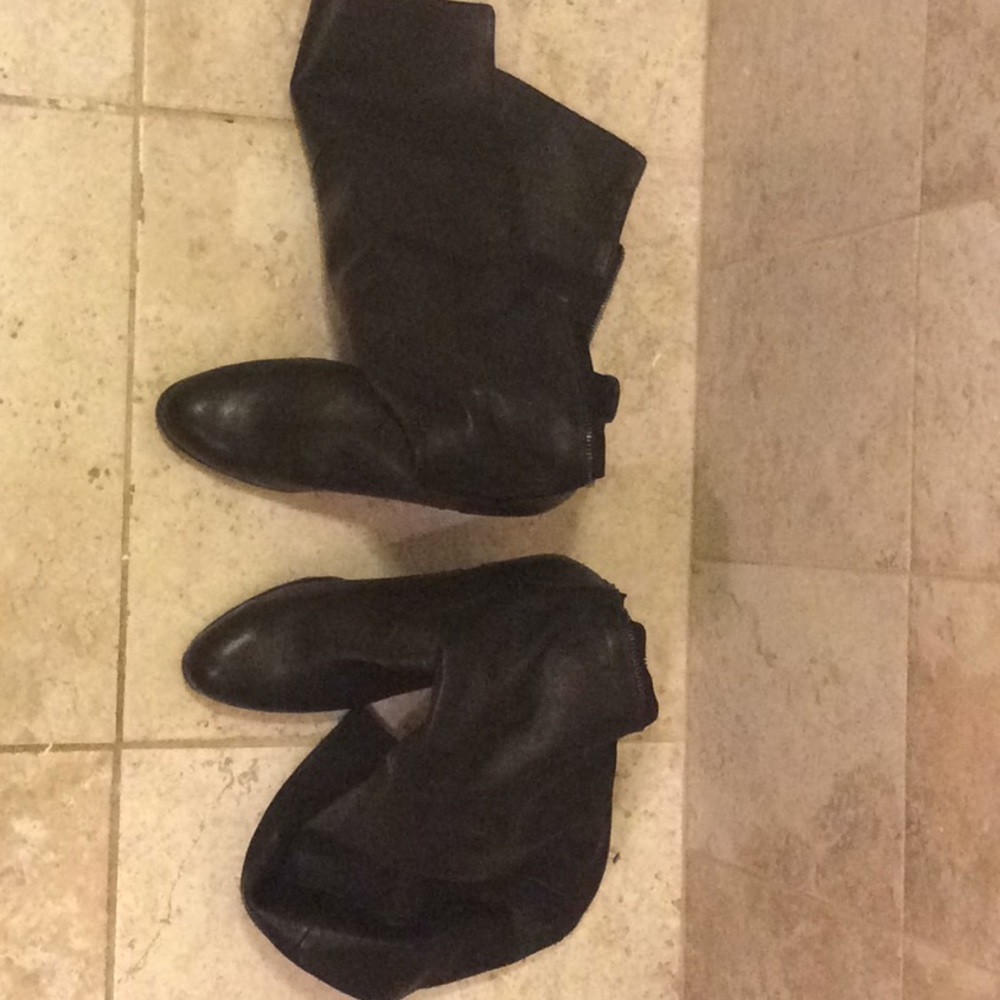Black, leather boots that go past the knee!