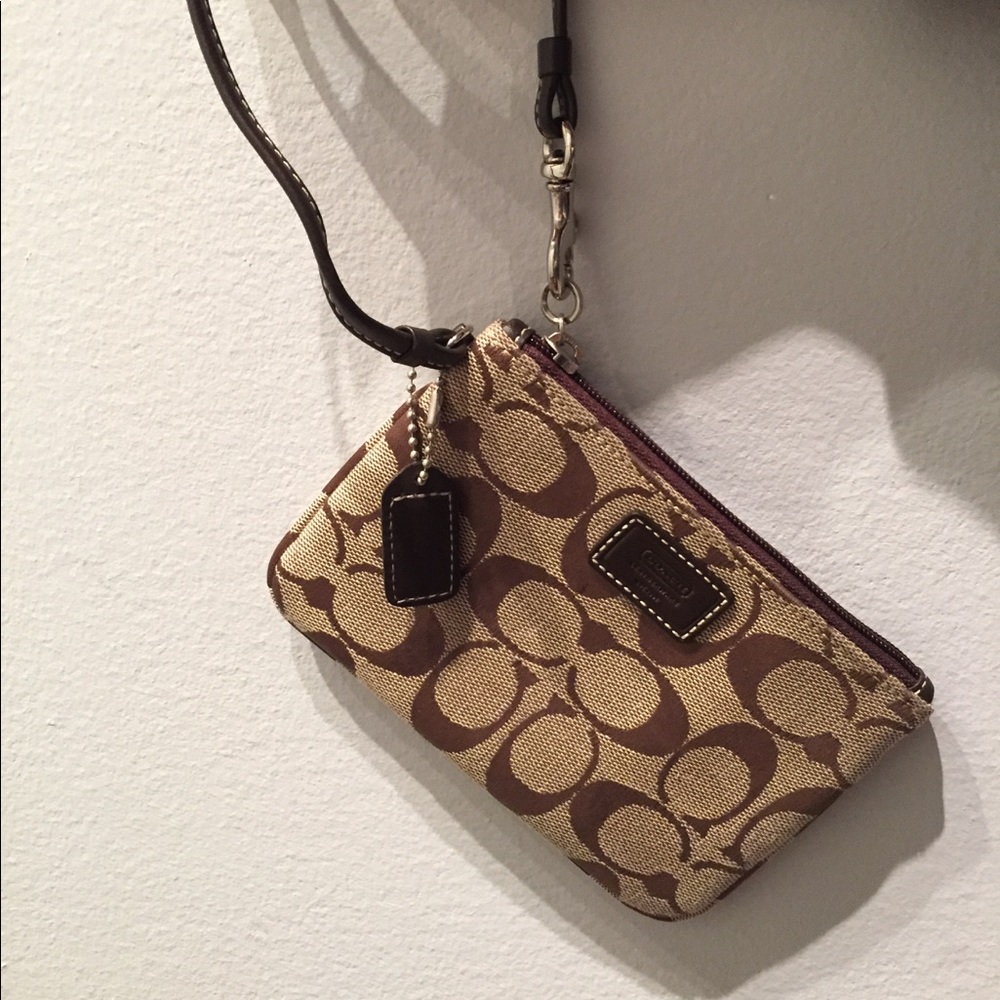 Coach signature wristlet.