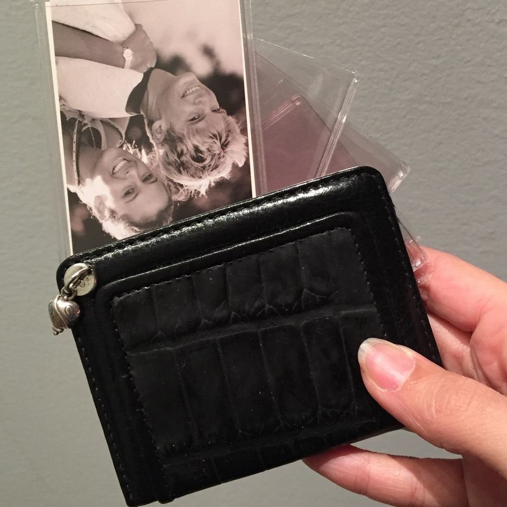 Black leather Brighton photo wallet.
