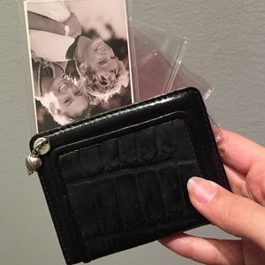 Black leather Brighton photo wallet.