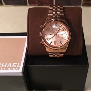 Micheal Kors Watch like new in the box.