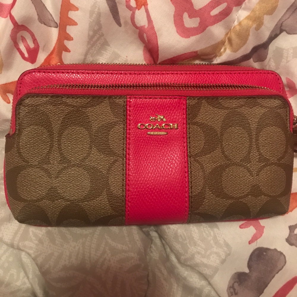 Double zip Coach wristlet! Hardly used.