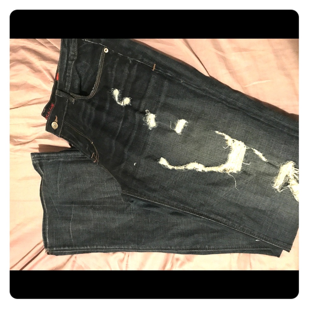 Distressed Dark Denim Jeans