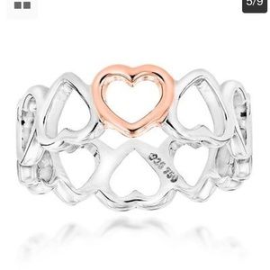 Heart eternity ring. Sterling one rose gold heart.