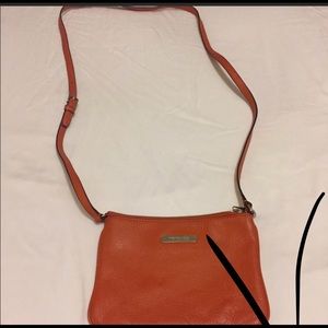 Orange Michael Kors crossbody bag