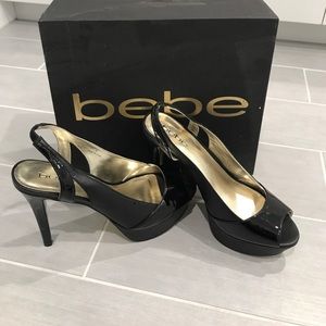 Brand new black bebe stilettos. Size 8.