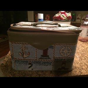 BROWN AND GRAY LEATHER BAG.