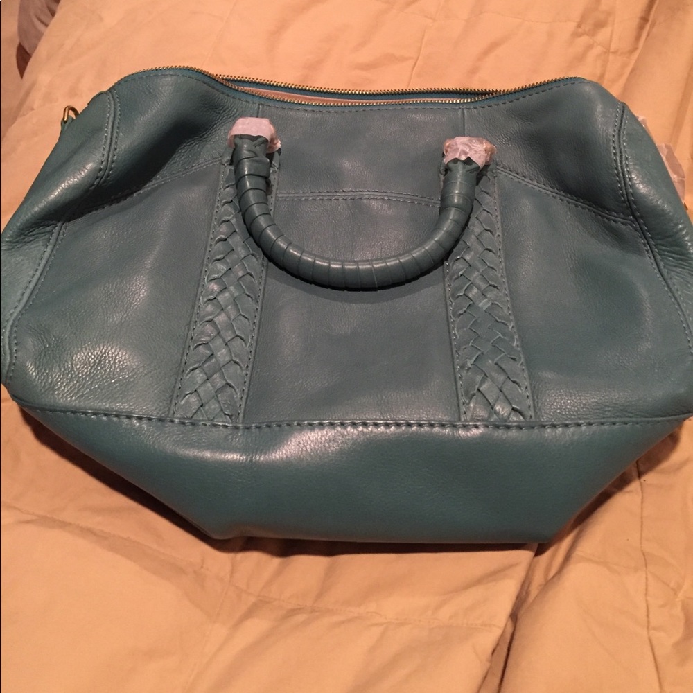 Foley & Corinna turquoise handbag. New: In bag