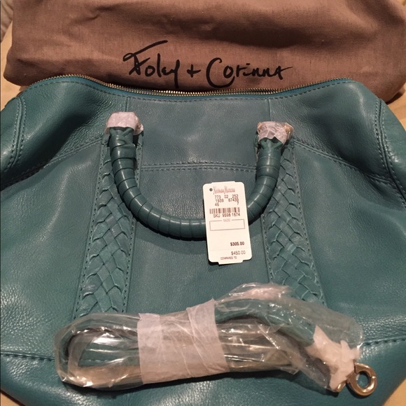 Foley & Corinna turquoise handbag. New: In bag