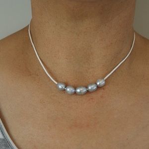 Silver Pearls on White Leather