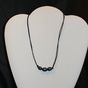 Black Pearls on Black Leather