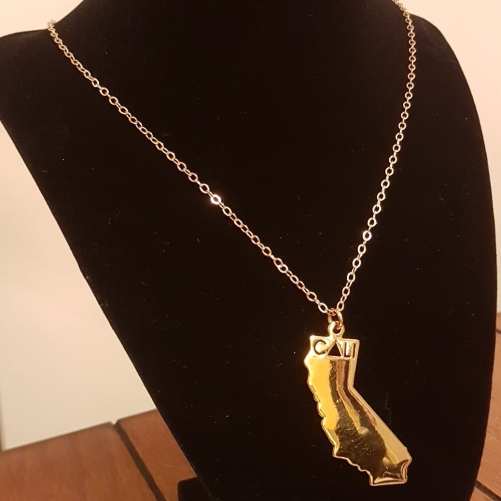 Gold designer Jami Cali statenecklace ladies
