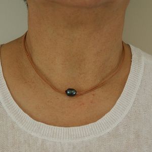 Black Pearl on Brown Leather