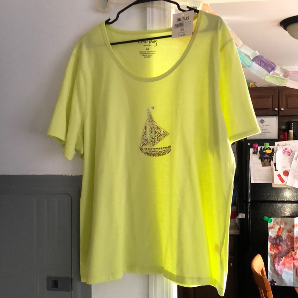Lovely blouse new with tags with pretty jewels