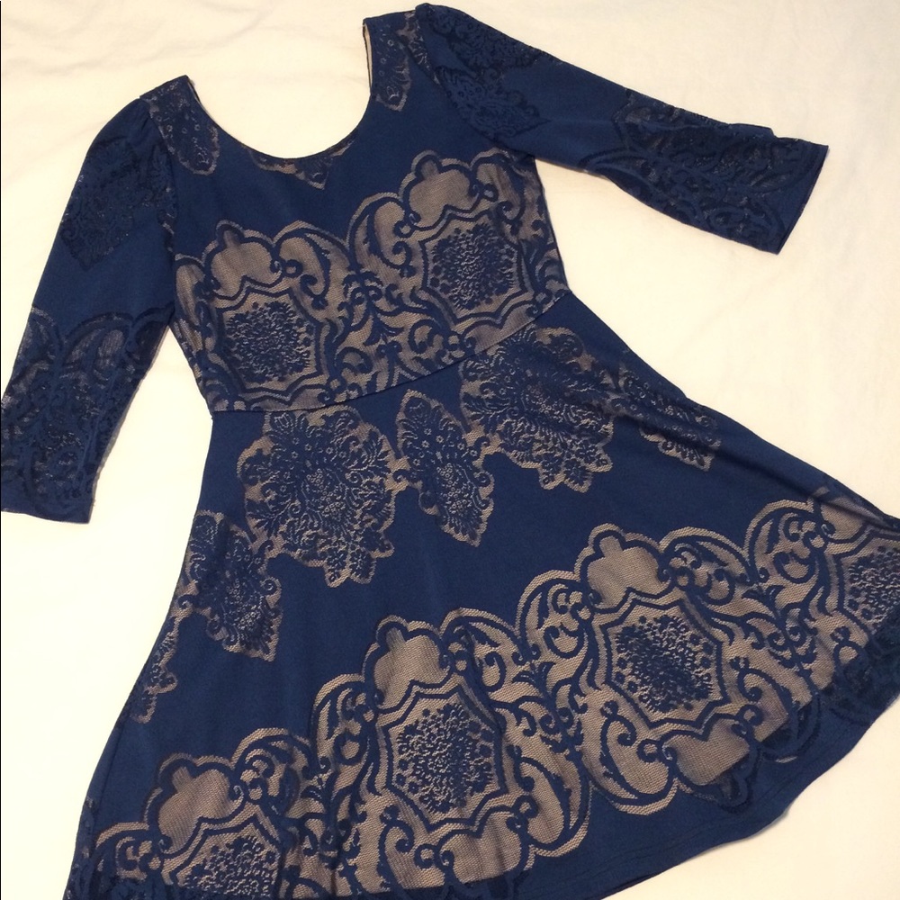 Boutique dress. Over the knee, 3/4 length sleeves