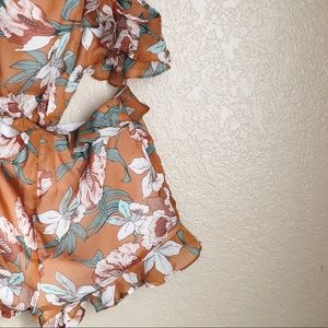 RUFFLED BACKLESS ROMPER