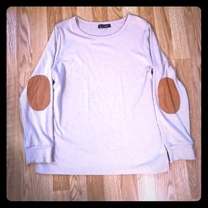 Women’s long sleeve shirt.