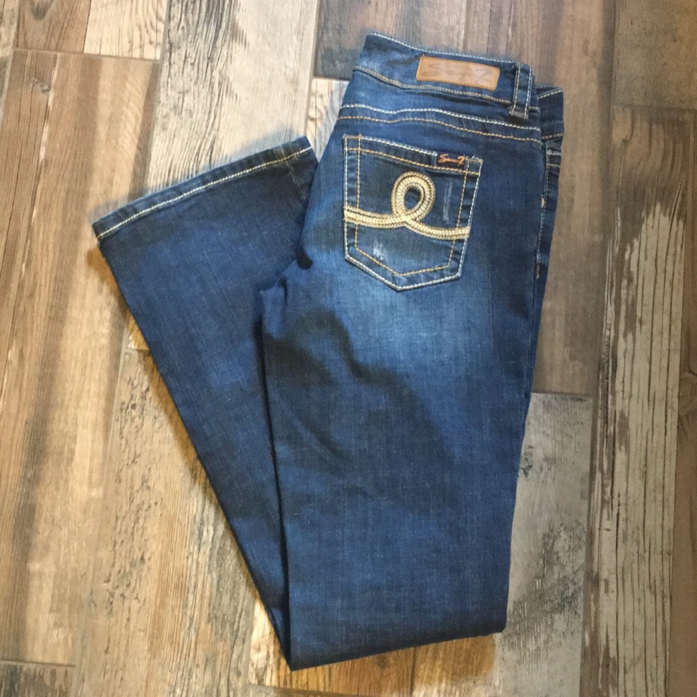 Distressed seven jeans