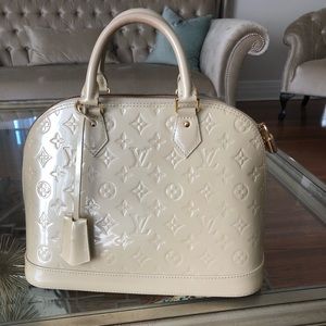Louis Vuitton Alma Handbag