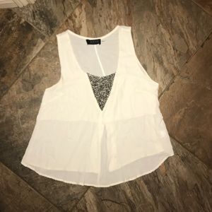 White polyester shirt with beading