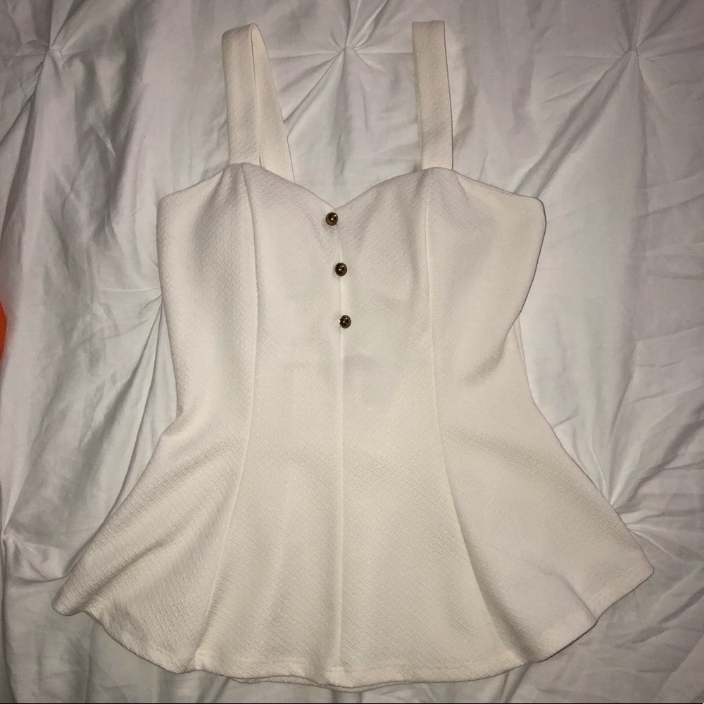 Peplum Ivory top size woman’s Medium stretchy