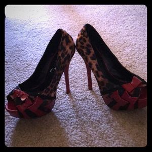 Speed limit 98 cheetah print pump heel