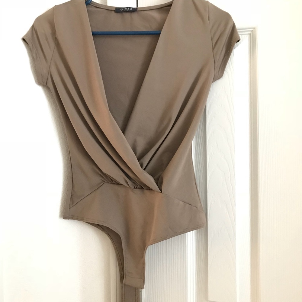 Tan body suit