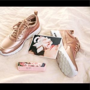 Rose gold Nike: barely worn!