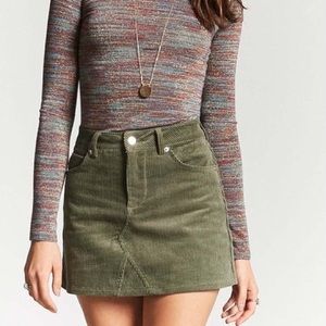 Green corduroy mini skirt