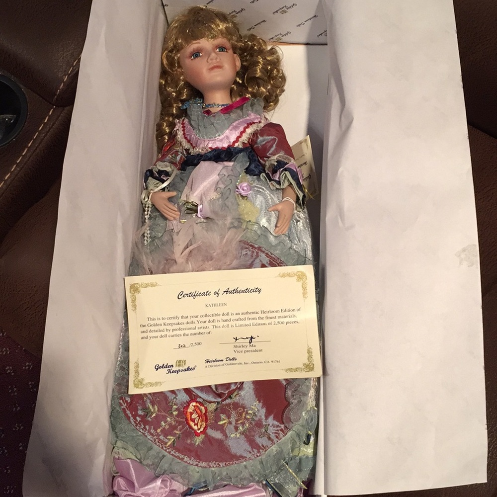 Golden keep sake doll