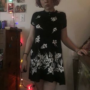 A black dress with Hawaiian flowers