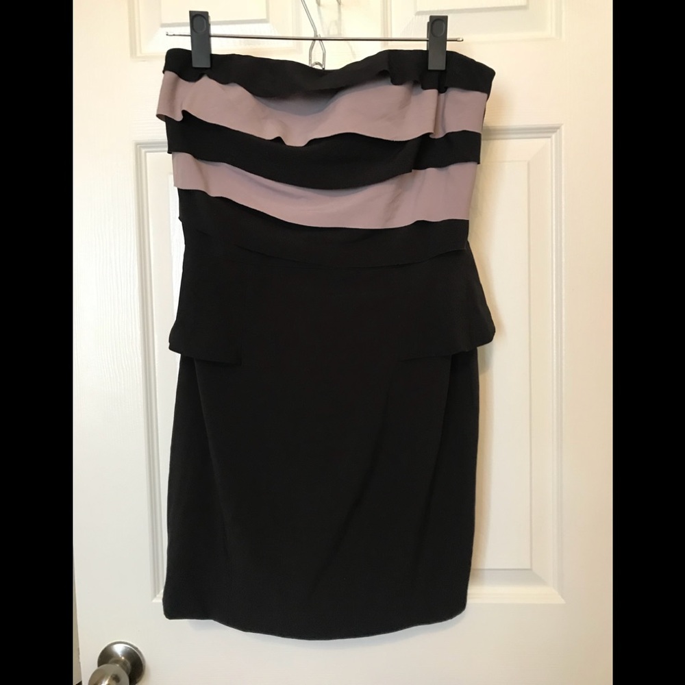 Chic little black peplum dress