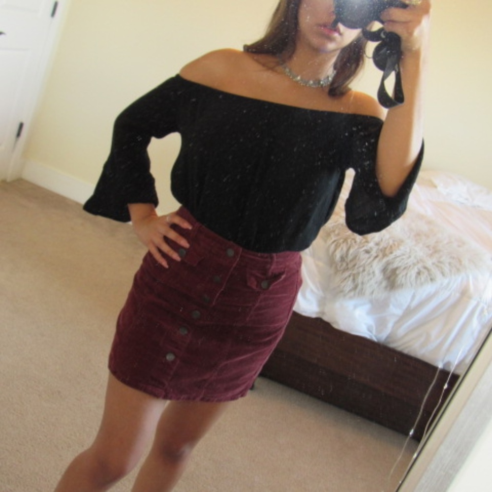 Black flow off the shoulder top