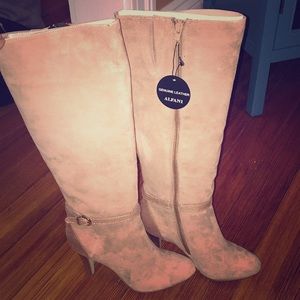 Brand new suede knee-high boots.