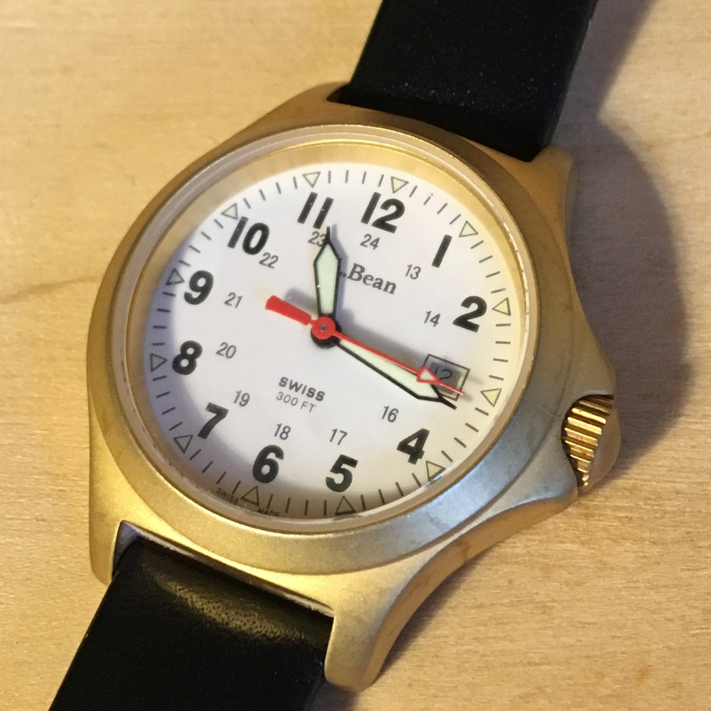 L.L. Bean woman's gold tone field watch w/ black
