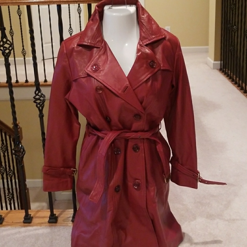 Dark red leather trench coat.