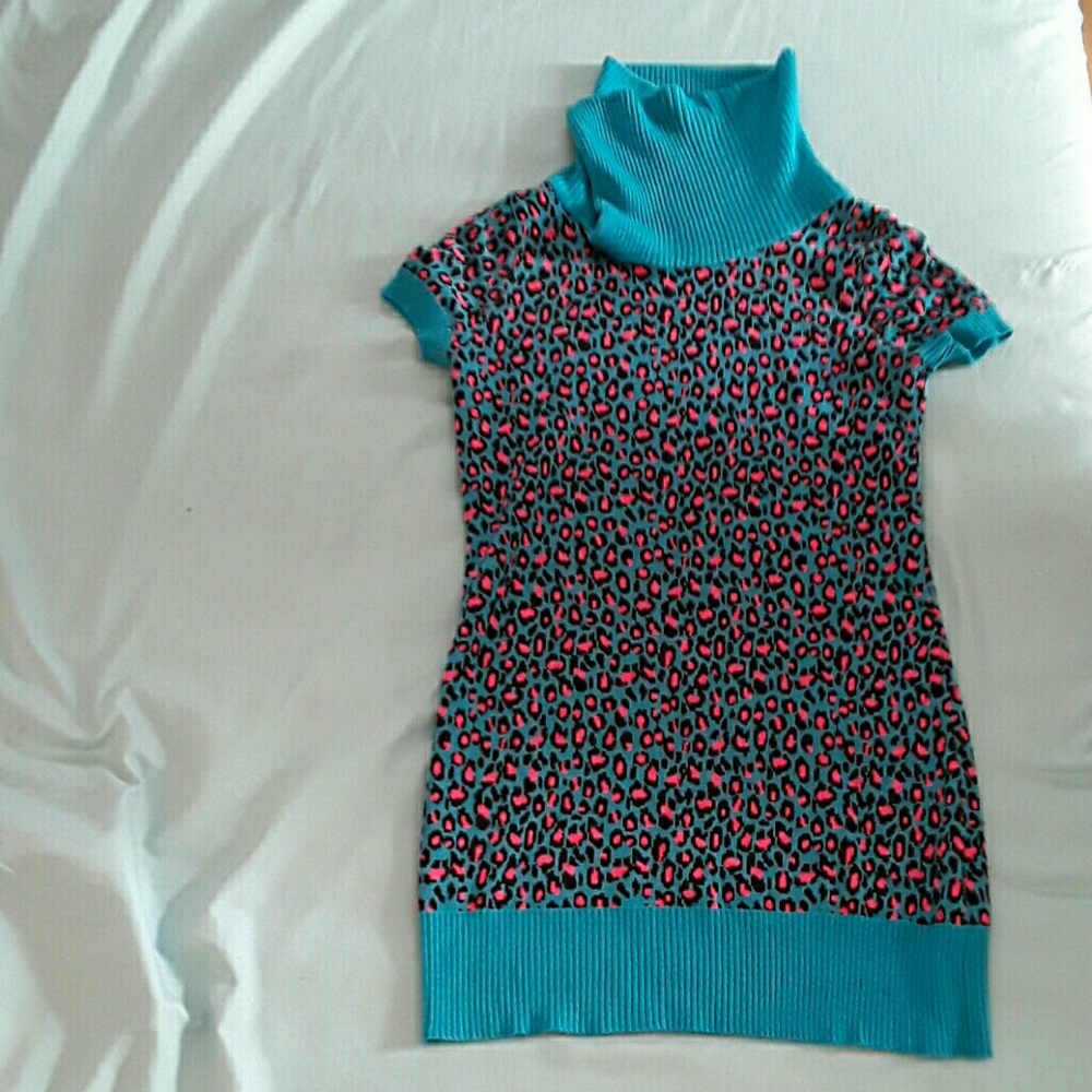 I'm selling a kid's medium sized- sweater dress.