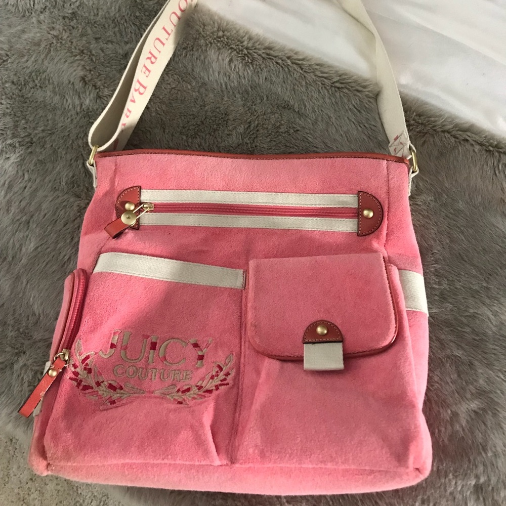 Juicy Couture diaper bag with changing mat.