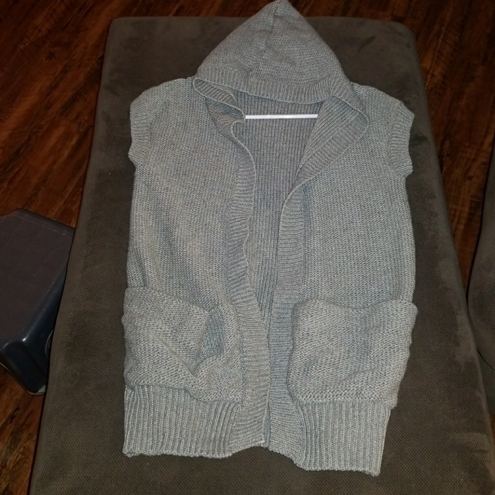 Knitted Sleeveless hoodie.