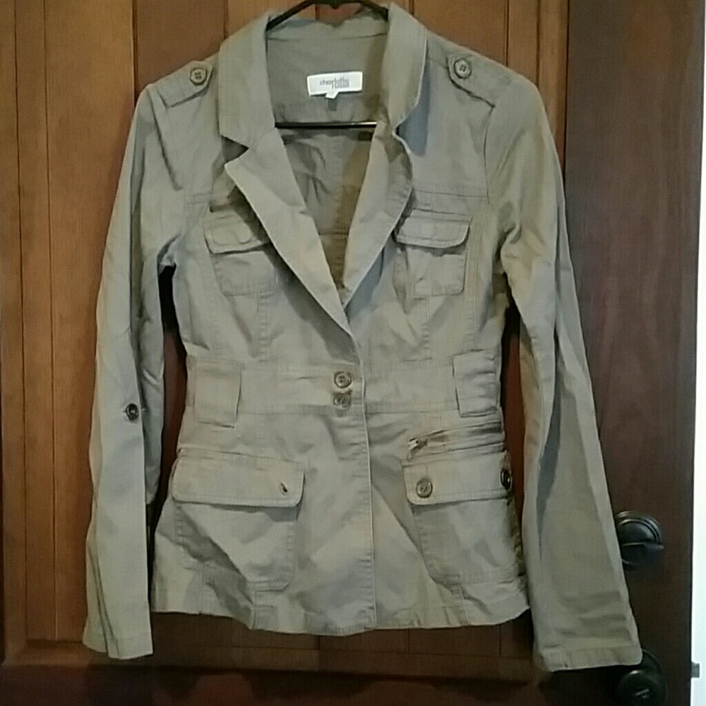Cute dress up-dress down jacket. Never worn.