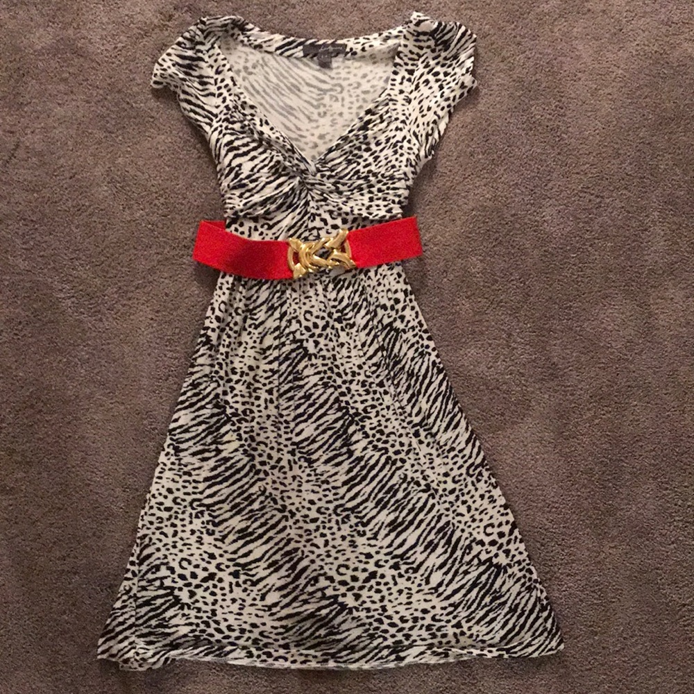 Black and white stretch dress with red belt