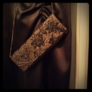 Ladies sleeveless green satin cocktail dress.